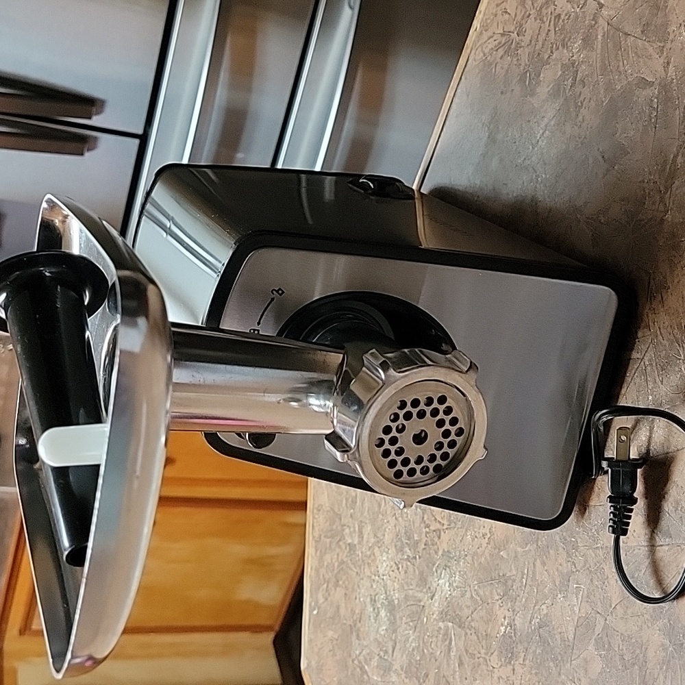 Meat grinder and sausage maker